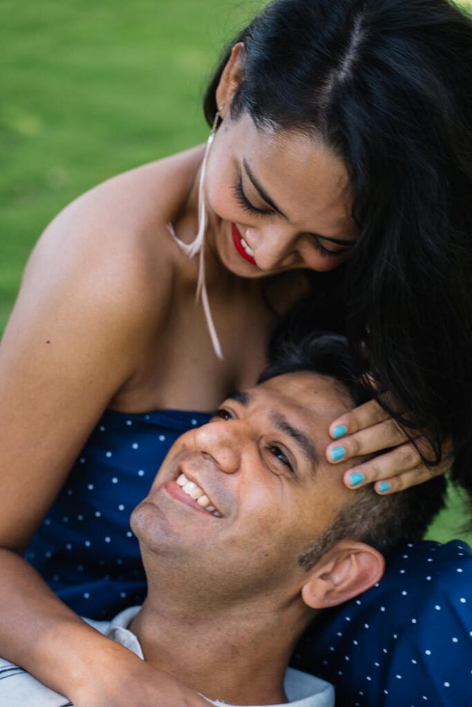 pexels photo 5119607 Happy couple sharing a tender moment outdoors, showcasing love and togetherness.